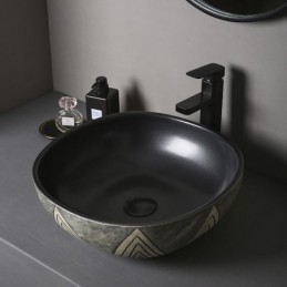 Schwarzes Waschbecken mit...